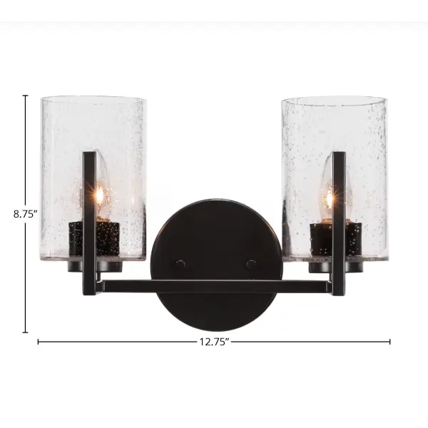 The Atlas 2-Light Bath Bar combines contemporary matte black styling with unique clear bubble glass shades. Its compact 12.75" width makes it ideal for smaller bathrooms while providing ample illumination with dual 100W bulbs. - alternate view