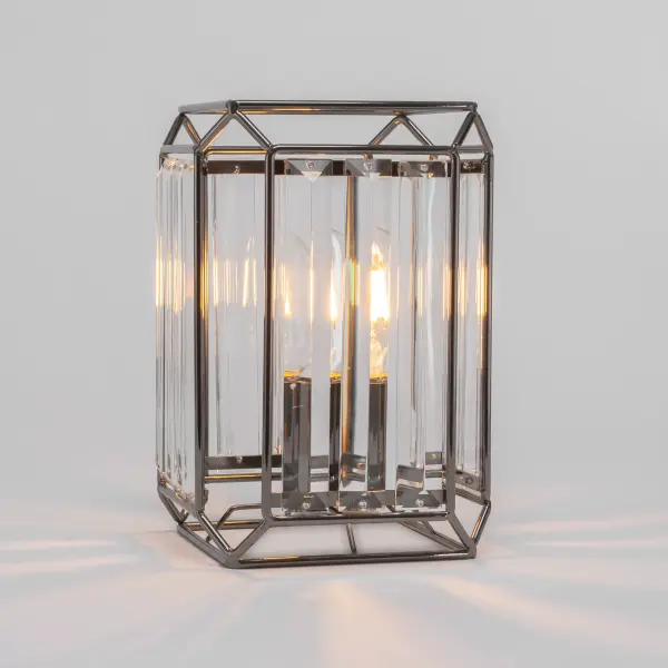 The Genesis Accent Lamp delivers contemporary style in a compact 6.75" footprint. Its black chrome finish adds sophisticated contrast while the included 3W LED bulb provides efficient illumination with dimming capability.