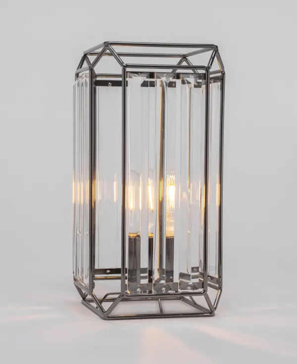 The Genesis Accent Lamp combines contemporary styling with practical functionality. Its black chrome finish adds modern elegance to any space, while the included 3W LED bulb provides warm, inviting light with exceptional energy efficiency.