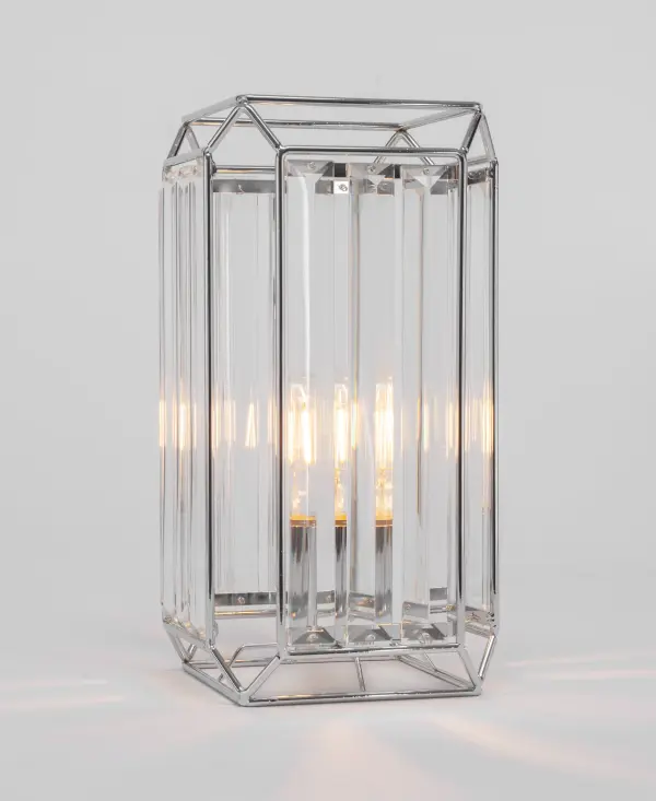 The Genesis Accent Lamp combines modern elegance with practical functionality. Its compact 7.5" width and chrome finish make it perfect for contemporary spaces, while the included 3W LED bulb provides warm, energy-efficient lighting.