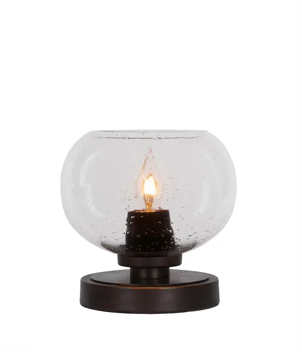The Luna Accent Lamp combines sophisticated design with functional lighting. Its Dark Granite finish and unique 7" clear bubble glass shade create visual interest while providing warm ambient light for any space.
