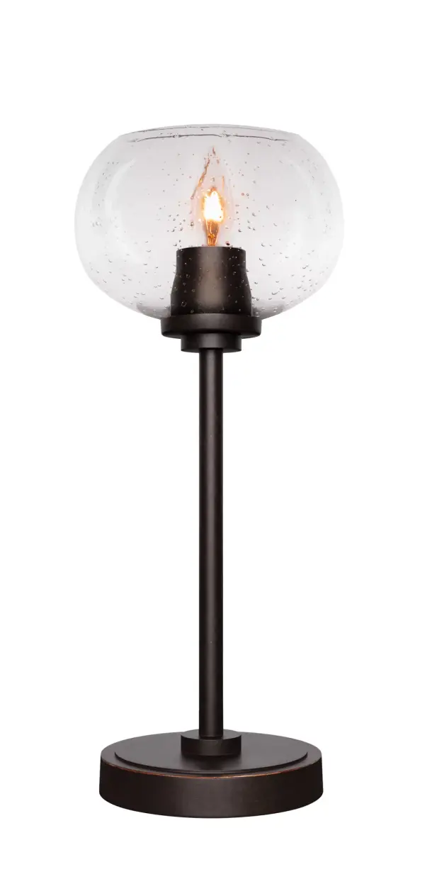 The Luna Accent Lamp combines modern sophistication with whimsical design through its dark granite finish and unique 7" clear bubble glass shade. At 16.5" tall, it's perfectly sized for intimate spaces while providing warm ambient lighting.