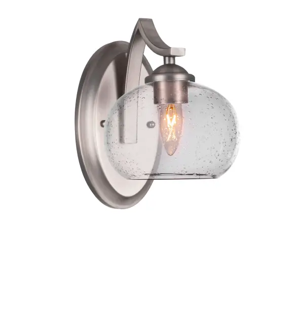 The Zilo Wall Sconce combines contemporary design with unique bubble glass detailing in a sophisticated graphite finish. Its compact 7-inch profile and versatile up/down mounting make it ideal for bathrooms, hallways, and accent lighting.