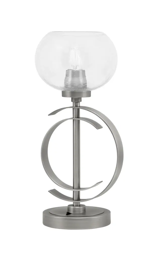 This contemporary accent lamp combines a sleek graphite finish with a unique 7-inch clear bubble glass shade, creating visual interest and warm ambient lighting. Compact at 16.5" tall, it's perfect for adding character to side tables and desks.