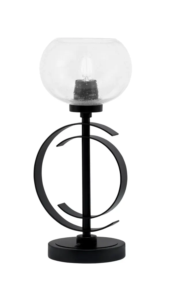 This contemporary accent lamp combines a sleek matte black finish with a unique 7" clear bubble glass shade, creating ambient lighting perfect for modern interiors. Compact at 16.5" tall, it's ideal for accent lighting.
