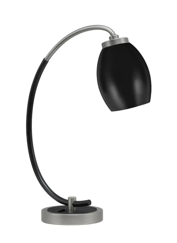 This elegant desk lamp combines graphite and matte black finishes with a 5" oval metal shade for sophisticated task lighting. The 18.25" height and adjustable design make it ideal for home offices and modern interiors.