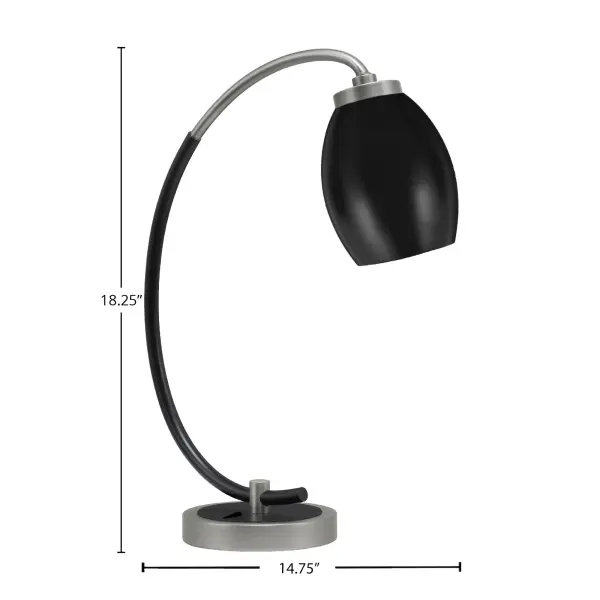 This elegant desk lamp combines graphite and matte black finishes with a 5" oval metal shade for sophisticated task lighting. The 18.25" height and adjustable design make it ideal for home offices and modern interiors. - alternate view