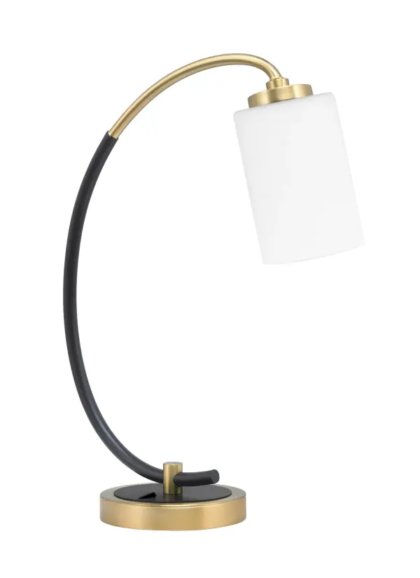This stylish desk lamp combines matte black and brass finishes for a sophisticated look that works in modern and transitional spaces. The white muslin glass shade provides soft, diffused light ideal for reading and workspace tasks.