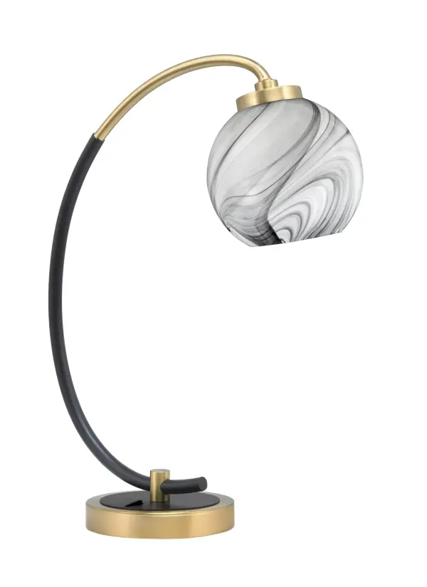 This sophisticated desk lamp combines a striking matte black and brass finish with a unique onyx swirl glass shade. Perfect for home offices and bedrooms, it delivers both ambient and task lighting with style.