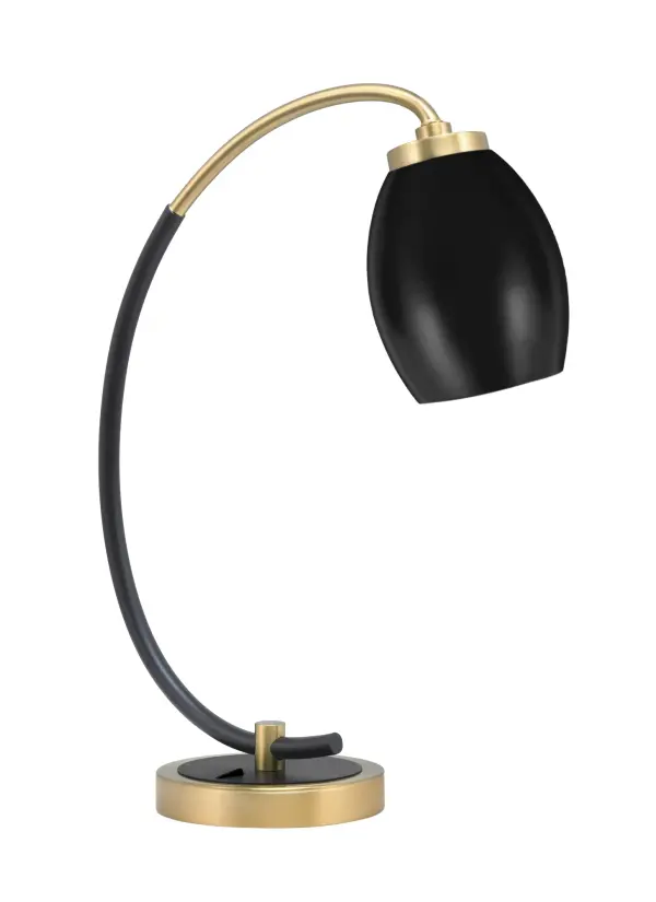 This Toltec desk lamp combines matte black and new age brass finishes for a striking contemporary look. The 5-inch oval metal shade directs light precisely where needed, making it ideal for task lighting in offices and study areas.
