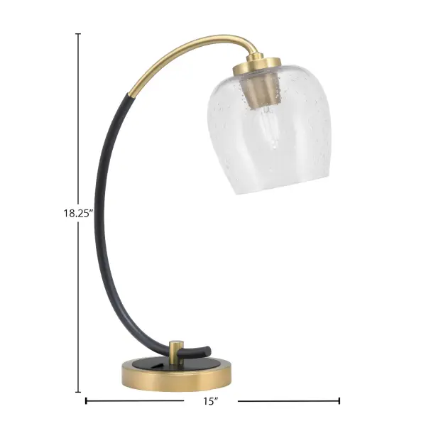 This stylish desk lamp combines matte black and brass finishes with a unique 6-inch clear bubble glass shade. Perfect for home offices and study areas, it provides focused task lighting with modern industrial flair. - alternate view