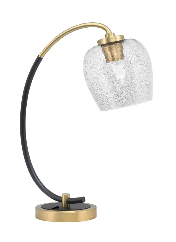 This striking desk lamp combines matte black and brass finishes with a unique 6" smoke bubble glass shade. Perfect for modern workspaces, it provides focused task lighting while serving as an elegant decorative accent.