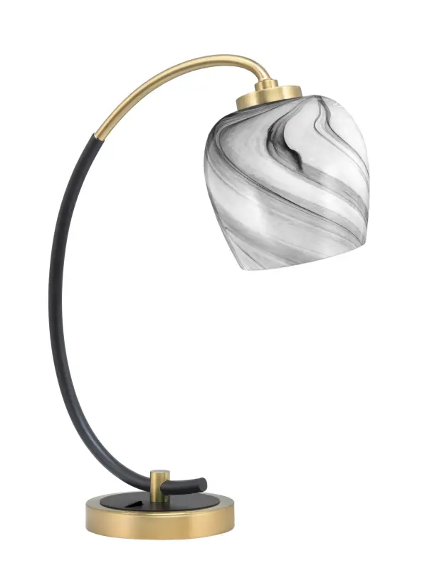 This contemporary desk lamp combines a striking matte black base with luxurious new age brass accents and a unique 6-inch onyx swirl glass shade. The artistic glass creates beautiful light diffusion while the dual-finish design adds sophisticated elegance to any workspace or bedroom.