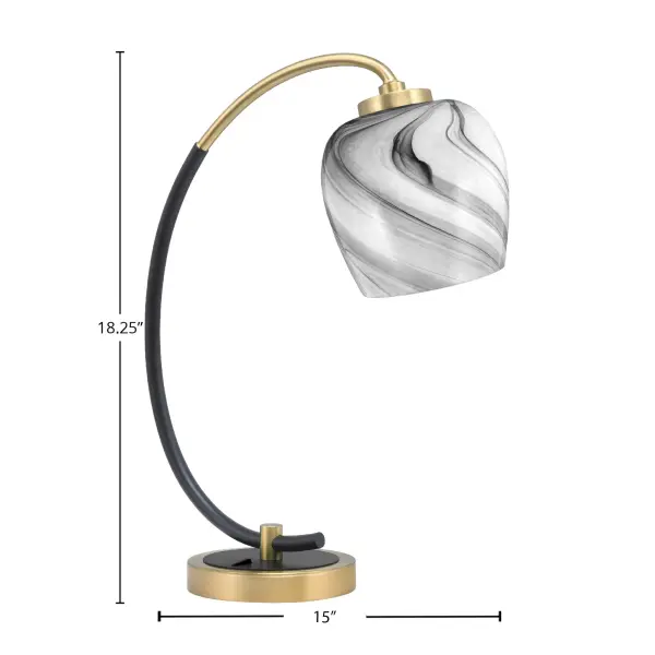 This contemporary desk lamp combines a striking matte black base with luxurious new age brass accents and a unique 6-inch onyx swirl glass shade. The artistic glass creates beautiful light diffusion while the dual-finish design adds sophisticated elegance to any workspace or bedroom. - alternate view