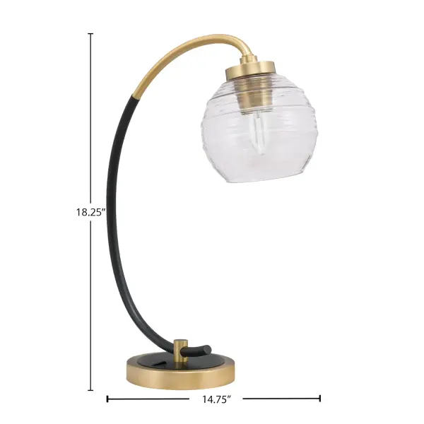 This stylish desk lamp combines industrial aesthetics with modern functionality. The matte black and graphite finish paired with a 6" clear ribbed glass shade creates visual interest while providing focused task lighting. - alternate view