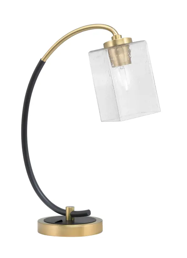 This contemporary desk lamp combines a sleek matte black base with new age brass accents and a unique 4-inch square bubble glass shade. The textured glass diffuses light beautifully while the dual-finish design adds visual interest to any workspace or bedroom.