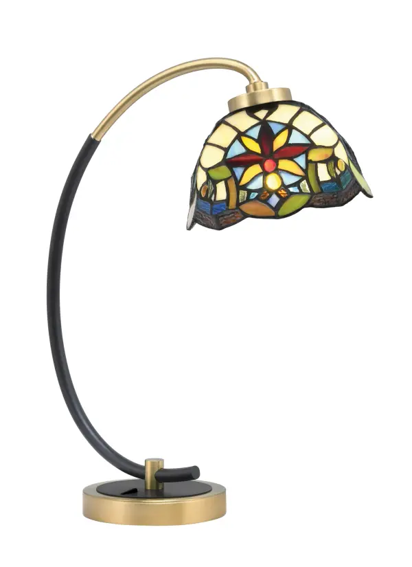 This striking desk lamp combines matte black and brass finishes with unique Earth Star art glass for a sophisticated look. Perfect for task lighting in home offices or as an accent piece in bedrooms and living spaces.
