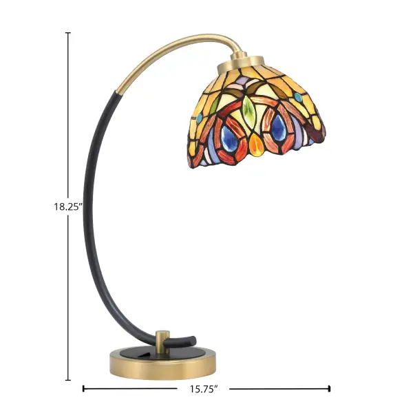 This striking desk lamp combines a sophisticated matte black base with new age brass accents and a handcrafted 7" Lynx art glass shade. Perfect for task lighting with style, it features convenient on-base rocker switch control. - alternate view