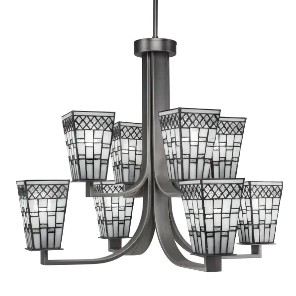 The Apollo chandelier combines industrial-inspired graphite metalwork with elegant pewter art glass shades. Eight uplights create ambient illumination perfect for dining and entertaining spaces. Adjustable height and sloped ceiling compatibility offer versatile installation options.