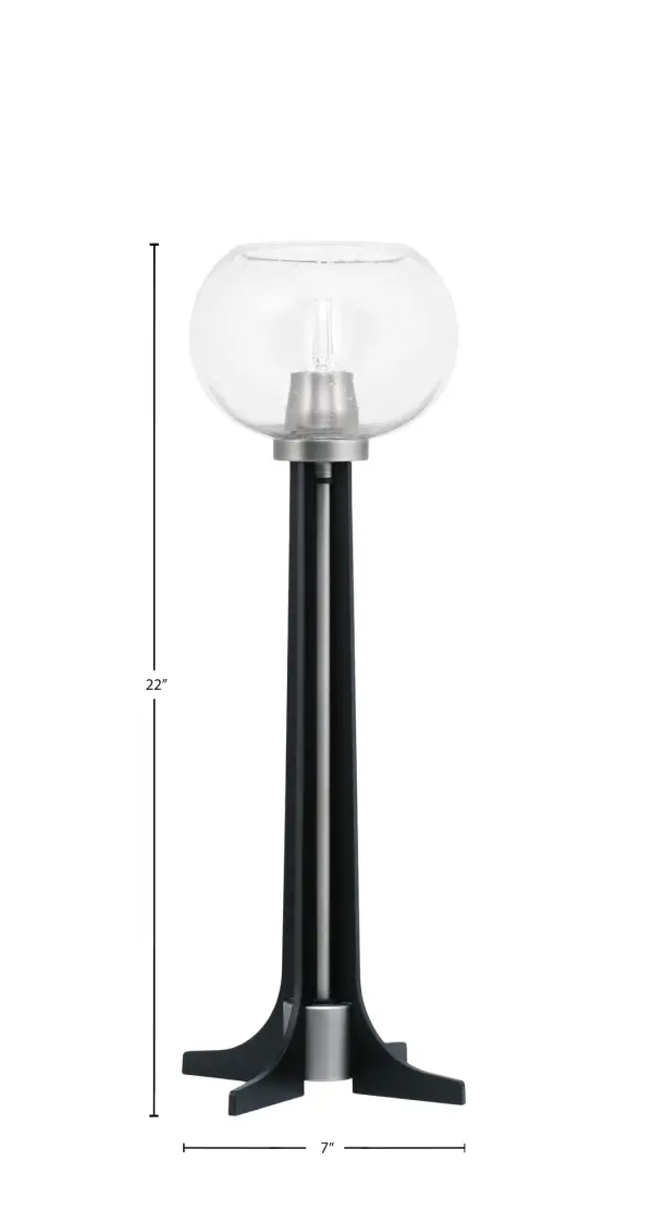 This striking accent lamp combines industrial style with modern elegance through its graphite and matte black finish paired with a unique 7" clear bubble glass shade. At 22" tall, it provides excellent task lighting while serving as a decorative focal point. - alternate view
