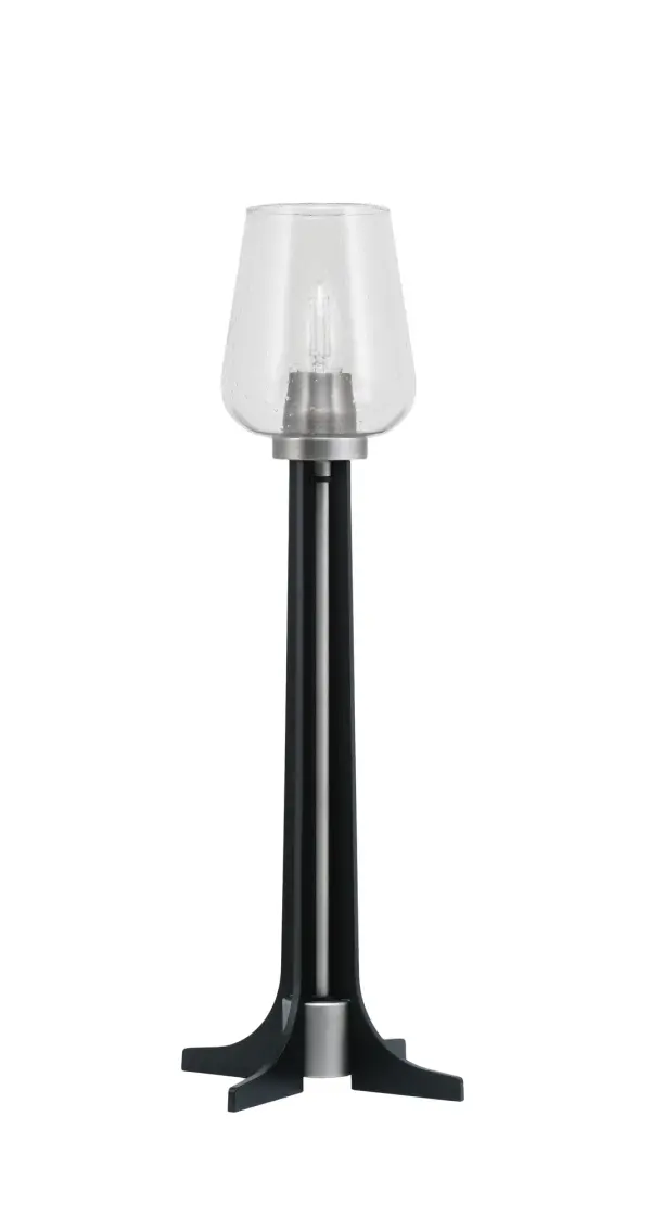 This contemporary accent lamp combines a sleek graphite and matte black finish with unique clear bubble glass for a sophisticated modern look. At 23" tall with an 8.5" base, it's perfectly sized for desks and side tables.
