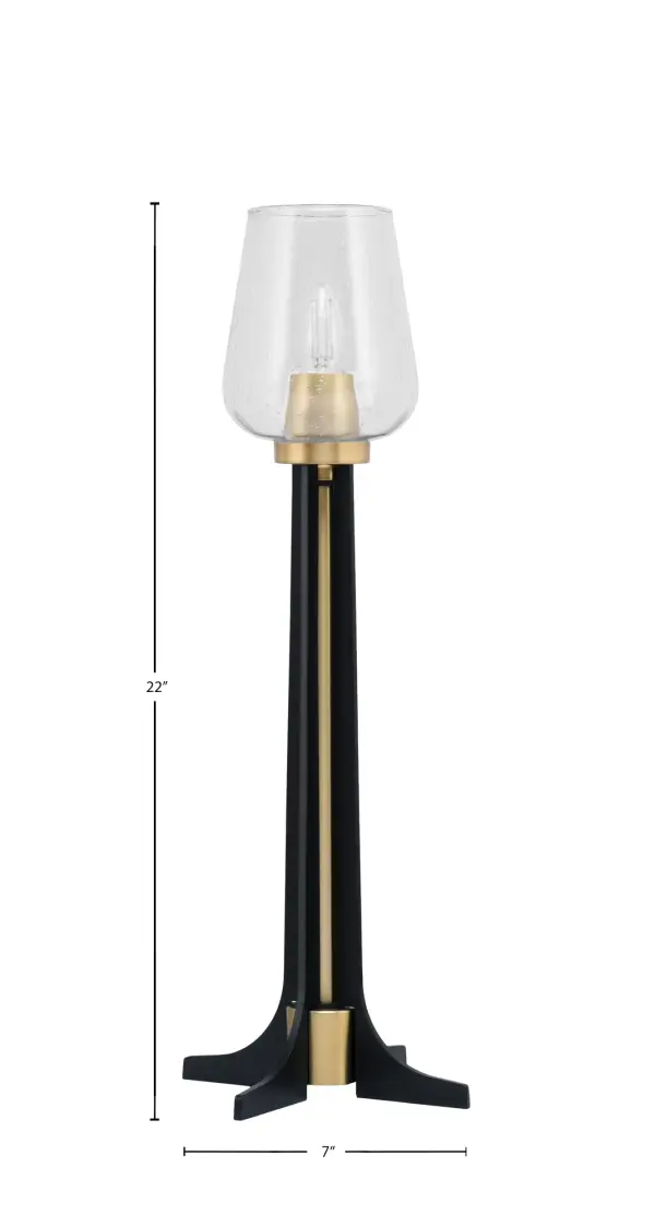 This contemporary accent lamp combines matte black and brass finishes with a unique 5" clear bubble glass shade. At 23" tall, it's perfectly sized for side tables and desks, offering both ambient lighting and visual interest. - alternate view