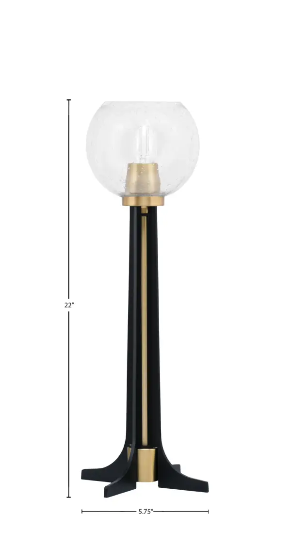 This contemporary accent lamp combines matte black and new age brass finishes for a sophisticated two-tone look. The 5.75" clear bubble glass shade creates visual interest while providing soft, diffused lighting. Compact at 22" tall, it's perfect for adding modern style to any space. - alternate view