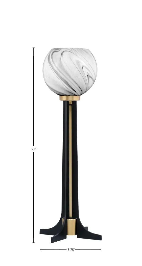 This sophisticated accent lamp combines matte black and new age brass finishes with a unique 5.75" onyx swirl glass shade. At 22" tall with an 8.5" base, it's perfectly sized for side tables and desks, offering both ambient lighting and decorative appeal. - alternate view