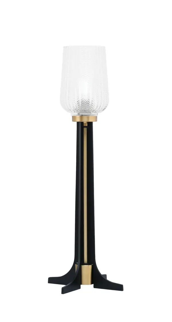 This contemporary accent lamp combines matte black and new age brass finishes for a sophisticated look. The 5" clear textured glass shade adds visual interest while providing warm ambient lighting. At 24.25" tall, it's perfectly sized for bedside tables, end tables, or office desks.