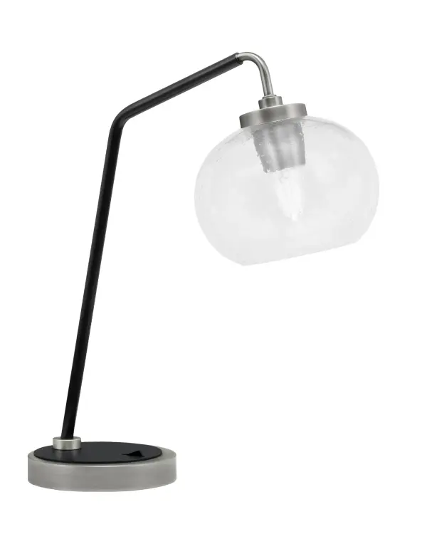 This elegant desk lamp combines modern industrial styling with functional design. The graphite and matte black finish paired with a unique 7-inch clear bubble glass shade creates visual interest while providing warm, focused task lighting.