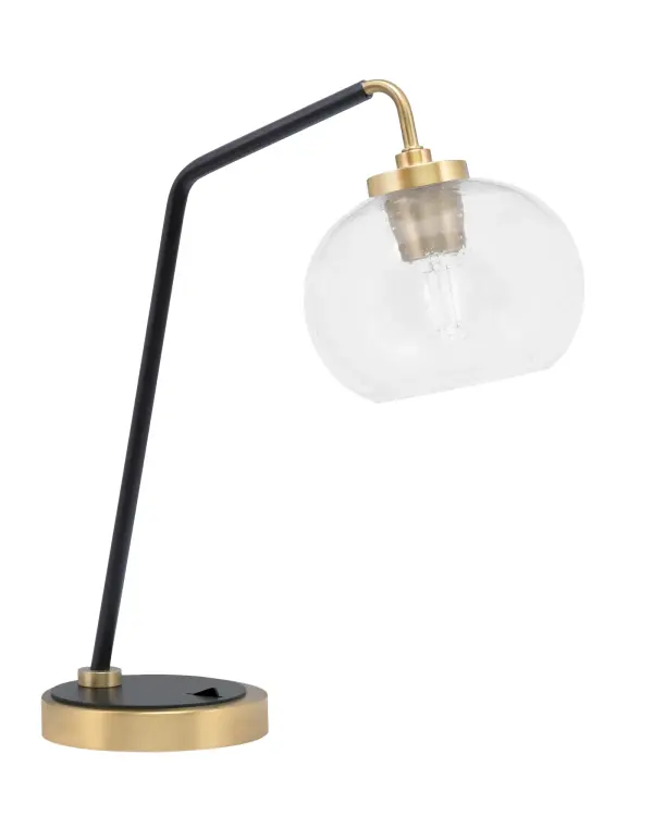 This striking desk lamp combines matte black and brass finishes with a unique 7-inch clear bubble glass shade. Perfect for home offices and study areas, it delivers both task lighting and modern style.