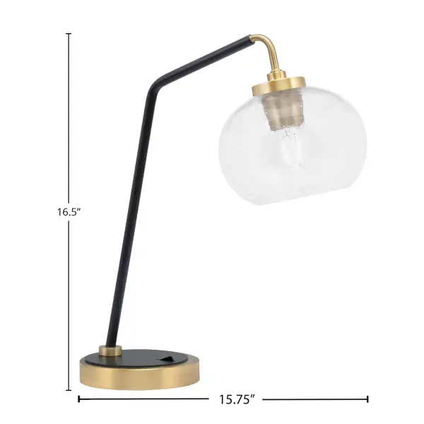 This striking desk lamp combines matte black and brass finishes with a unique 7-inch clear bubble glass shade. Perfect for home offices and study areas, it delivers both task lighting and modern style. - alternate view