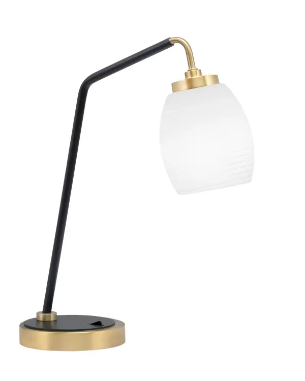 This contemporary desk lamp combines matte black and brass finishes for a striking modern aesthetic. The white linen glass shade provides soft, diffused task lighting perfect for work or reading spaces.