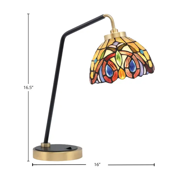 This striking desk lamp combines a matte black base with new age brass accents and a handcrafted 7-inch Lynx art glass shade. Perfect for modern offices and contemporary homes, it delivers both functional task lighting and decorative appeal. - alternate view