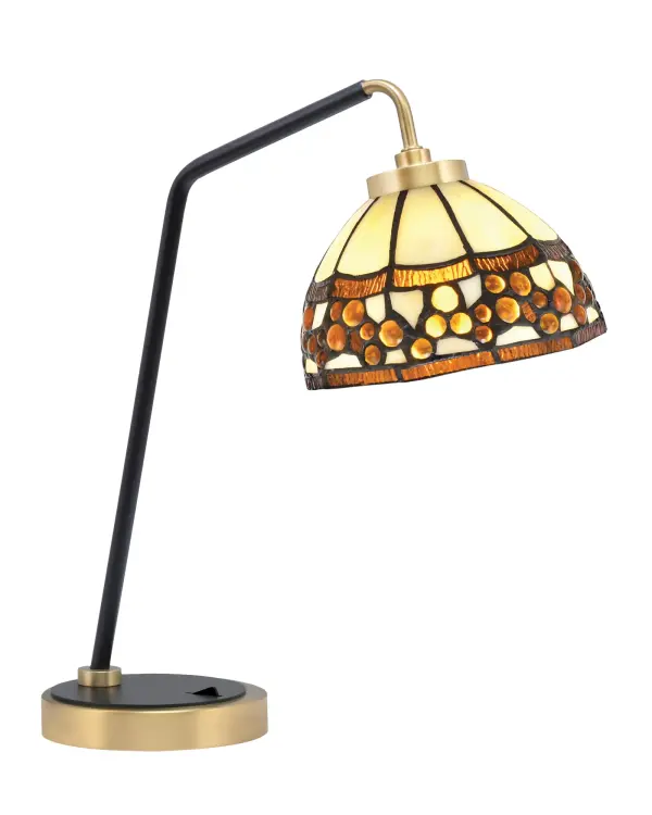 This sophisticated desk lamp combines a sleek matte black base with new age brass accents and a stunning 7-inch Roman Jewel art glass shade. The unique glass creates beautiful light diffusion while the dual-finish design adds visual interest to any workspace or bedroom.