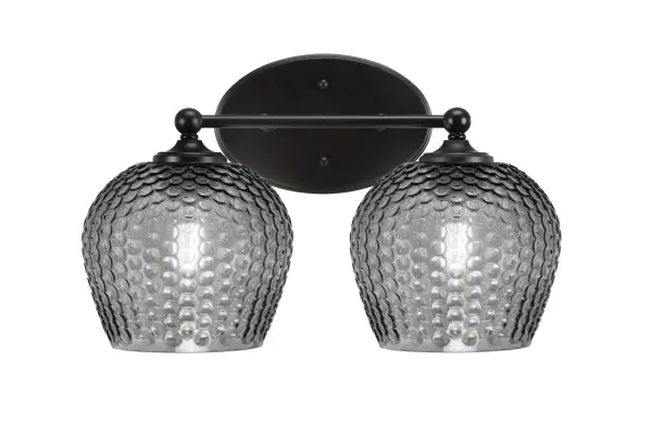 The Capri 2 Light Bath Bar delivers effortless modern style with its matte black finish and smoke textured glass shades. Perfect for contemporary bathrooms, it offers warm diffused lighting with dramatic contrast.