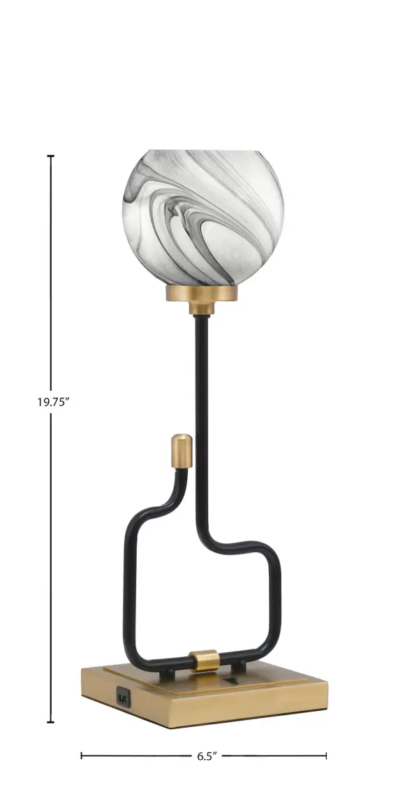 The Sandia Accent Lamp combines striking mixed-metal finishes with functional USB charging ports, making it perfect for modern living. The 5.75" Onyx Swirl Glass shade creates captivating light patterns while the compact design fits seamlessly on nightstands and desks. - alternate view