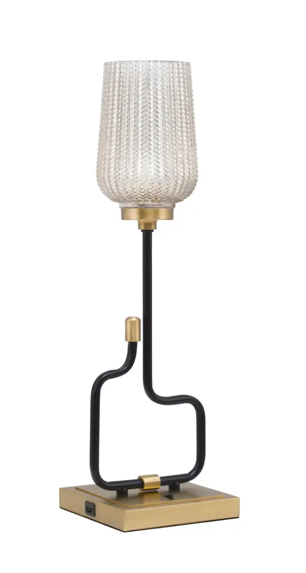 The Sandia Accent Lamp combines striking mixed-metal finishes with practical functionality. Featuring built-in USB ports and a textured glass shade, this 22" lamp delivers both style and convenience for modern living spaces.