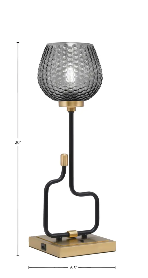 The Sandia Accent Lamp combines contemporary style with practical functionality. Its matte black and aged brass finish creates visual interest, while built-in USB ports add modern convenience for charging devices. - alternate view