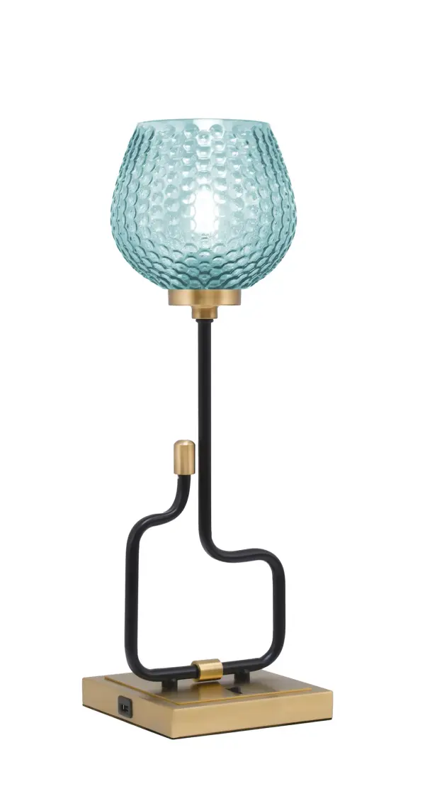 The Sandia Accent Lamp combines striking turquoise textured glass with a sophisticated matte black and aged brass finish. Built-in USB ports add modern functionality, while the compact 20" height makes it perfect for bedside tables and desks.