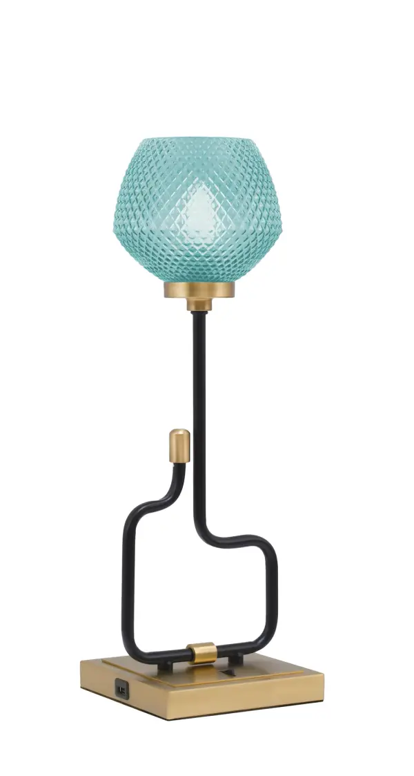 The Sandia Accent Lamp combines contemporary style with practical functionality. Its striking turquoise textured glass shade creates a warm, colorful glow while the dual-finish base adds visual interest. Built-in USB ports make it perfect for modern living.