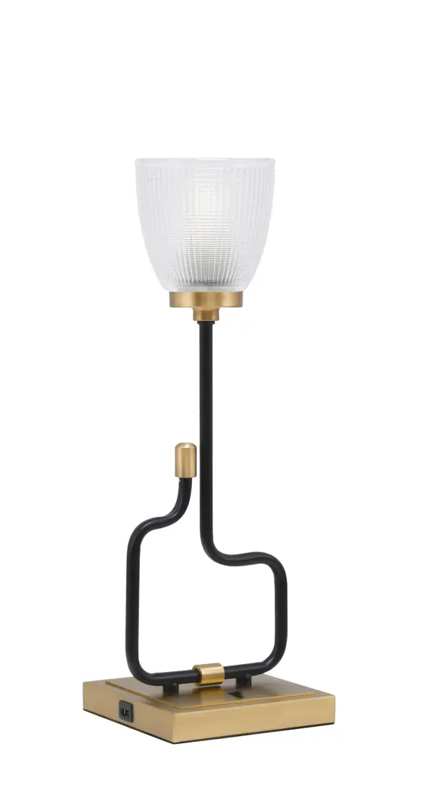 The Sandia Accent Lamp blends contemporary style with practical functionality. Its mixed metal finish and textured glass shade create visual interest, while built-in USB ports add modern convenience for bedside or desk use.