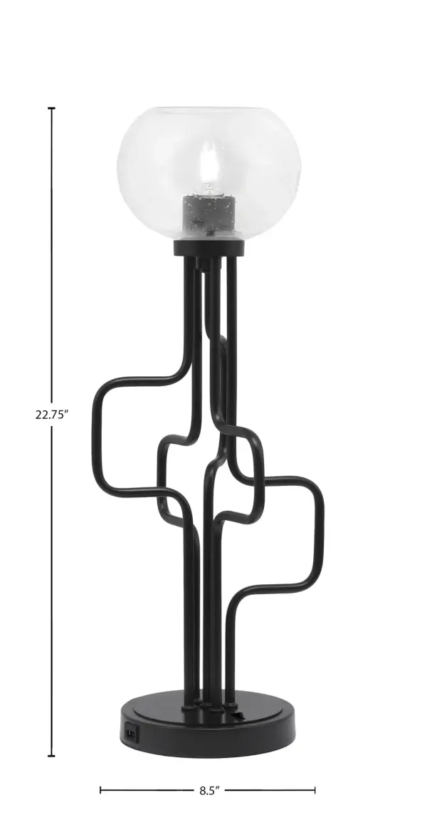 The Sandia Accent Lamp combines contemporary style with practical functionality. Its distinctive 7-inch clear bubble glass shade creates captivating light patterns, while integrated USB ports add modern convenience for charging devices. - alternate view