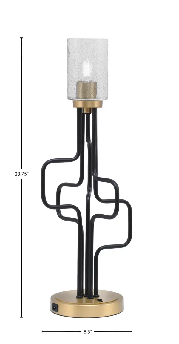 The Sandia Accent Lamp combines industrial aesthetics with modern functionality, featuring a striking matte black and aged brass finish paired with a unique smoke bubble glass shade. Built-in USB ports add practical convenience for charging devices. - alternate view