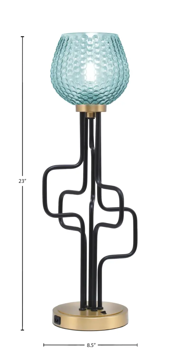 The Sandia Accent Lamp combines contemporary design with practical functionality. Its striking turquoise textured glass shade and two-tone matte black and aged brass finish create visual interest, while built-in USB ports add modern convenience. - alternate view