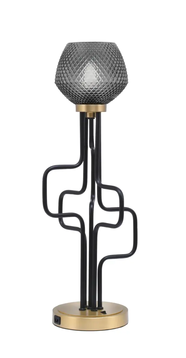 The Sandia Accent Lamp combines contemporary style with practical functionality. Its mixed metal finish and smoke textured glass shade create visual interest, while built-in USB ports add modern convenience for charging devices.