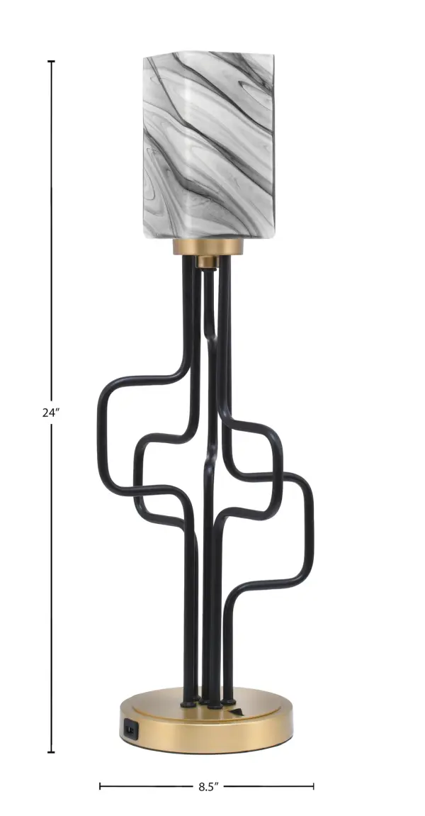 The Sandia Accent Lamp combines sophisticated two-tone metallic finishes with practical USB charging ports. Its compact 8.5" footprint and striking onyx swirl glass shade make it perfect for modern living spaces. - alternate view