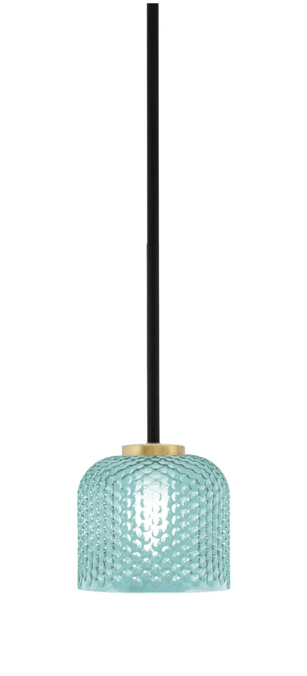 The Sandia mini pendant combines contemporary style with artisanal charm through its striking turquoise textured glass shade and sophisticated matte black and aged brass finish. Compact at 6" wide, it's perfect for adding character above kitchen islands, dining tables, or entryways.