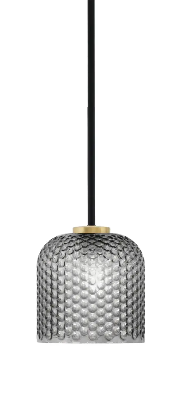 The Sandia mini pendant combines matte black and aged brass finishes with smoke textured glass for a sophisticated industrial look. At 7" wide, it's perfect for task lighting or clustered installations over islands and bars.