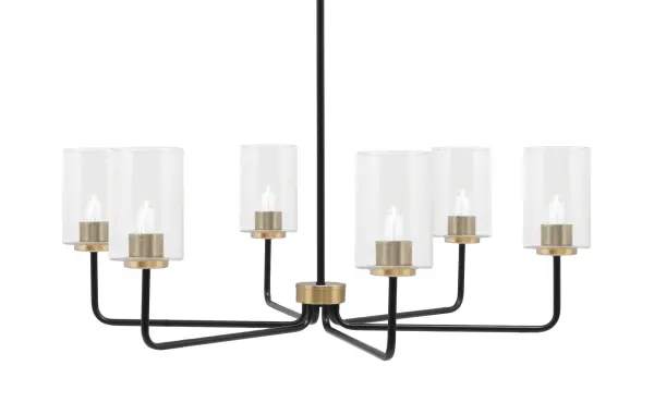The Sandia 6-Light Chandelier masterfully blends modern sophistication with vintage appeal through its two-tone matte black and new age brass finish. The distinctive 4-inch clear bubble glass shades create textured visual interest while casting warm, inviting light perfect for dining and entertaining spaces.